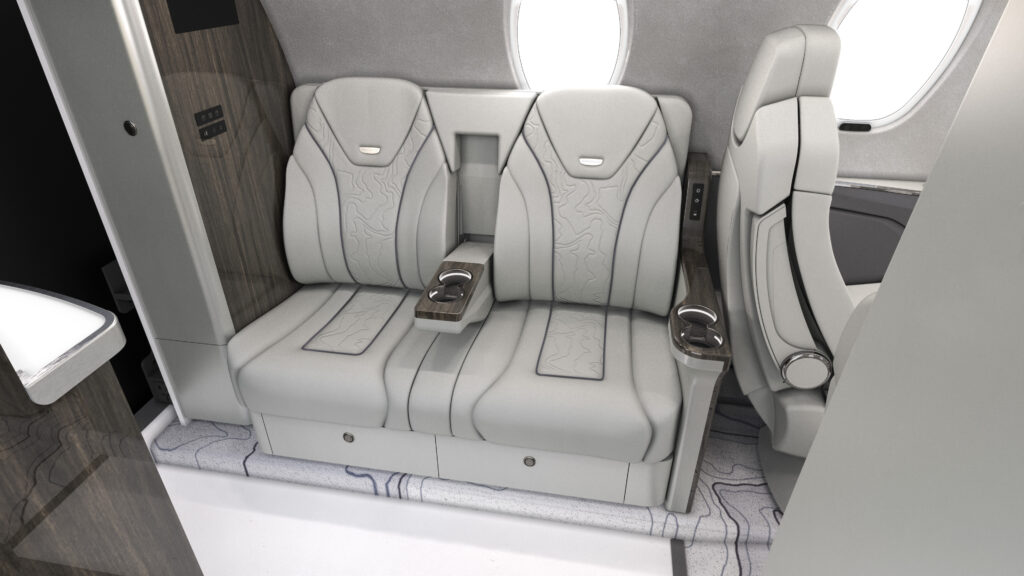 A pair of white and grey seats on board the new Cessna aircraft.