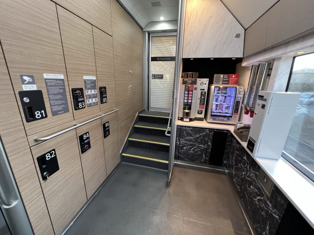 A car with lockers for luggage storage, and vending machines.