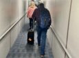 Passengers board an aircraft