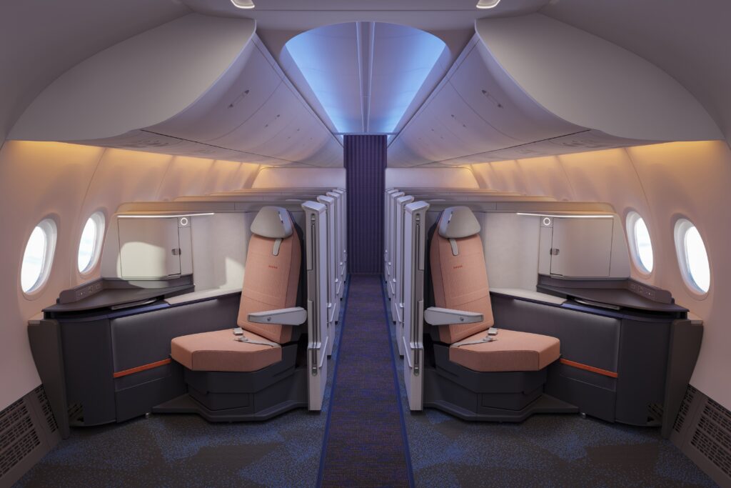 A view of the flydubai Safran Vue business class seat from the front. Large overhead bins and the signature Boeing Sky Interior's LED lighting can be seen.