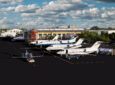 A series of bizjet aircraft are sitting outside the Banyan Air Service FBO. Banyan Air Service FBO will be doing installation for SmartSky Networks on private jets and turboprops