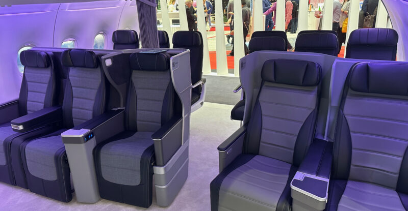 A five-abreast layout of Eclipse seats in the premium concept cabin. The seats are grey and black. HAECO ZIM