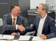 Neil Cairns, Chief Executive of Acro Aircraft Seating(left) and Nico Neumann, COO of Deutsche Aircraft (right) during the signing of the agreement in Hamburg