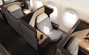 The business class seat on the Qantas A350 is all grey with a white head rest.
