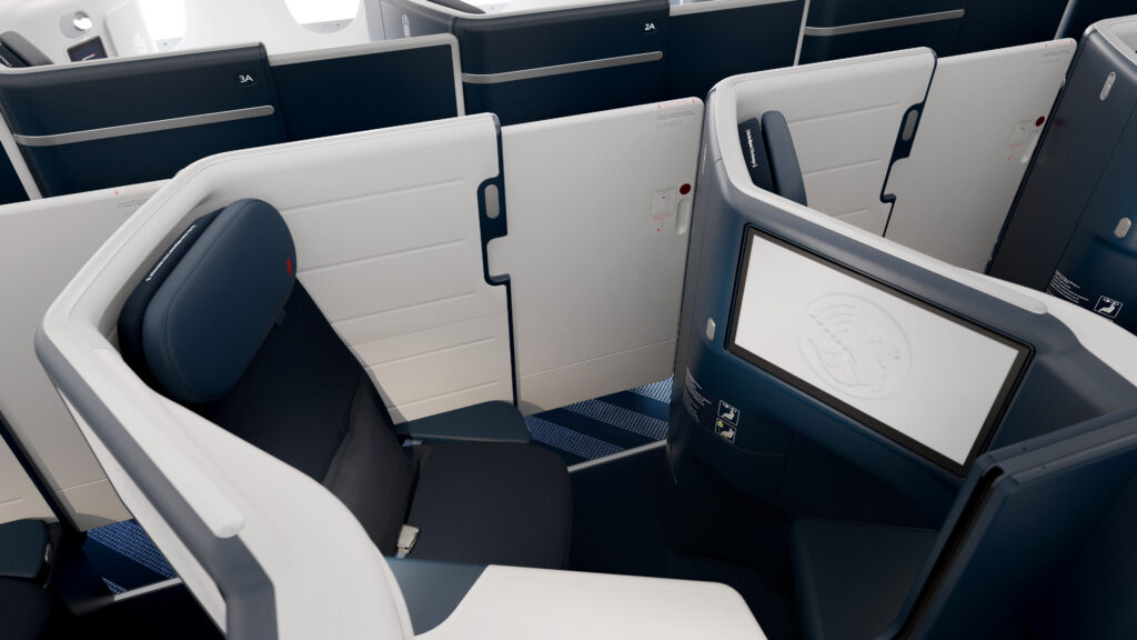 The door is closed on the Air France business class seat showing the amount of privacy a passenger will receive in the Opera seat by Stelia