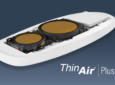 Rendering of the ThinKom ThinAir Plus antenna package, featuring the Ka2517 VICTS and a smaller ESA beside it in the same package, on a blue background