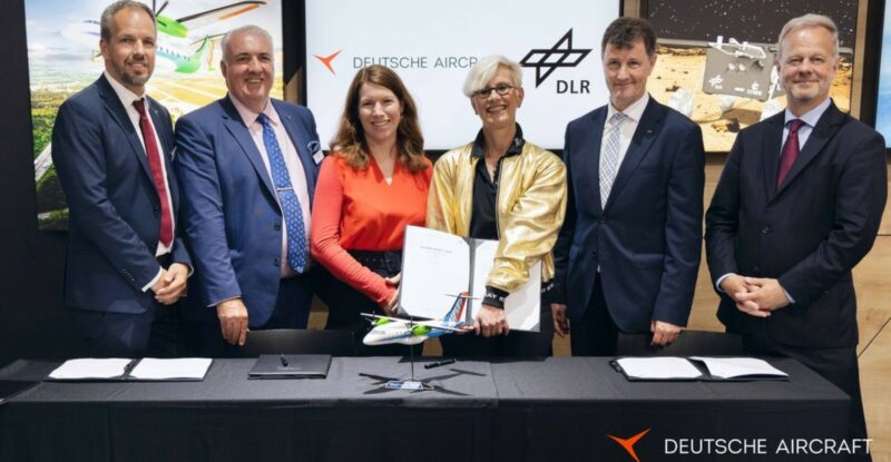 (From left to right): Nico Neumann, Chief Operations Officer at Deutsche Aircraft, Dave Jackson, CEO of Deutsche Aircraft, Dr. Anna Christmann, Coordinator for Aerospace of the German Federal Government, Prof. Dr.-Ing. Anke Kaysser-Pyzalla, Chairwoman of the Executive Board of the German Aerospace Centre (DLR), Dr.-Ing. Markus Fischer, Divisional Board Member Aeronautics at the German Aerospace Centre (DLR) and Alexander Reinhardt, Managing Director of German Aerospace Industries Association (BDLI)