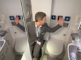 A man demonstrates the accessible lavatory by Diehl