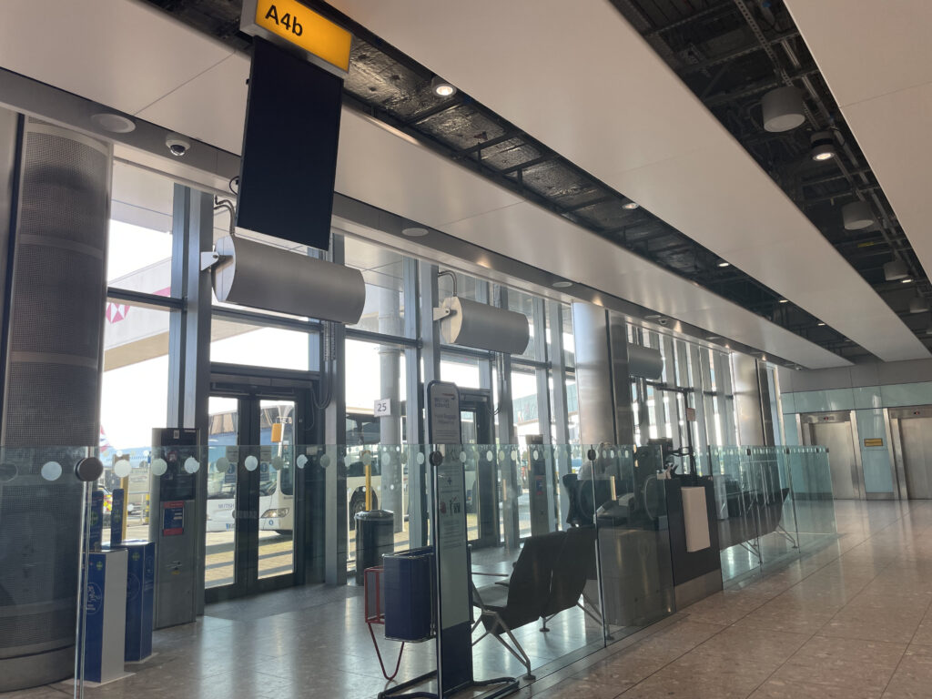 A few seats sit empty at the Heathrow gate, which will be used to board the BA A319.