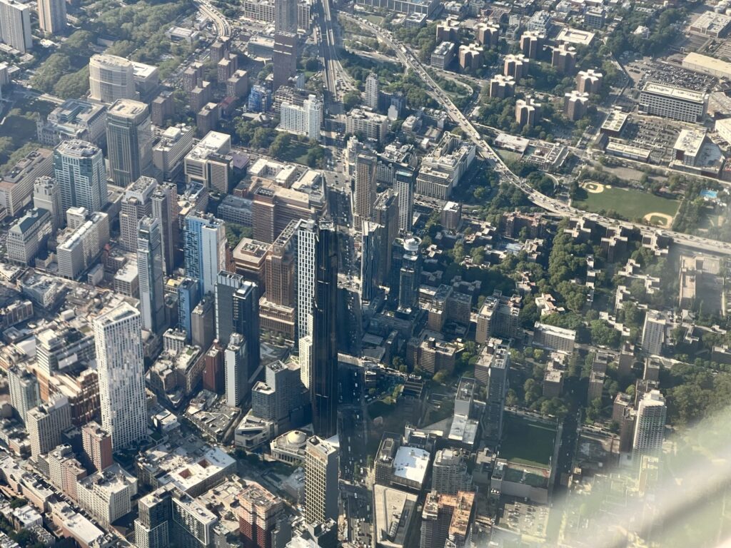 Flying over New York City on the United E175