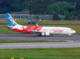 Air India Express Boeing 737-800 airplane at Changi Airport (SIN) in Singapore.