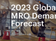 The words "2023 Global MRO DEMAND FORECAST" serve as a title, and are overlaid atop an aircraft that is in a MRO hangar.