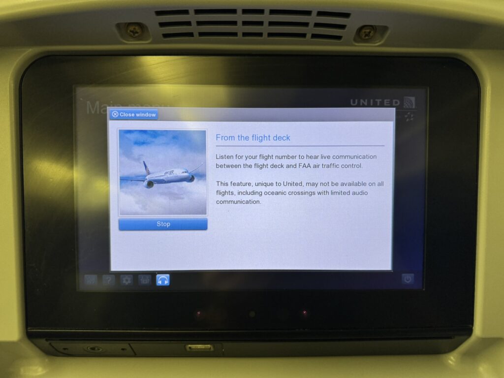 Panasonic IFE screens embedded into the economy seats of the aircraft, showing info "from the flight deck"