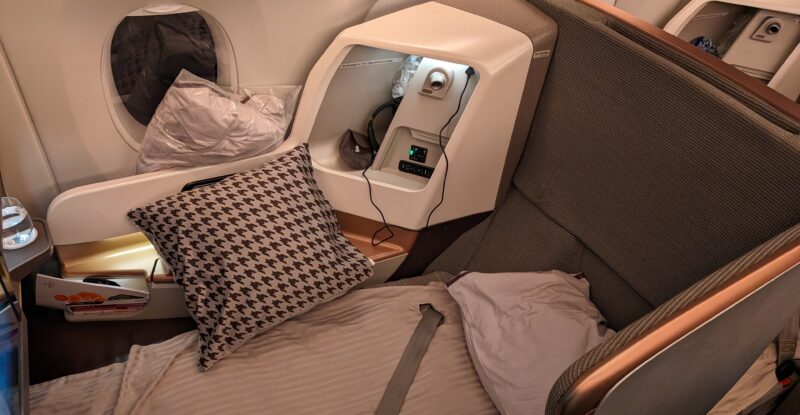 Singapore Airlines' JAMCO-made business class seat aboard the A350 ULR is wide and comfy seat, with rich browns.