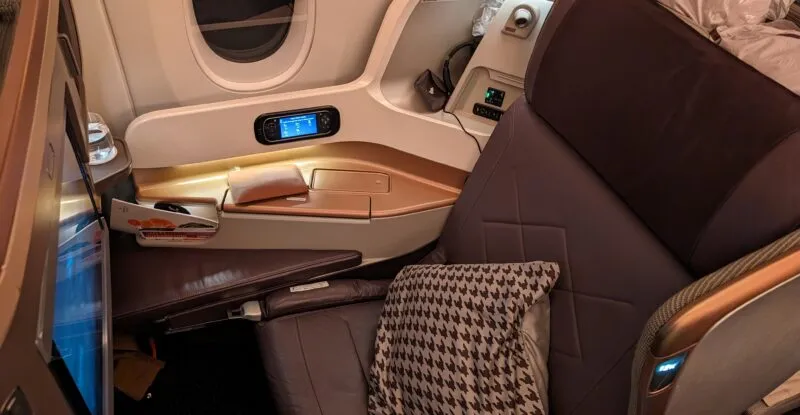 JAMCO's wide and comfy seat on SIA, with large IFE screen