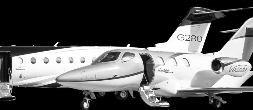 A HondaJet sits alongside a Gulfstream G280. Volato is expanding its fleet with both aircraft types.