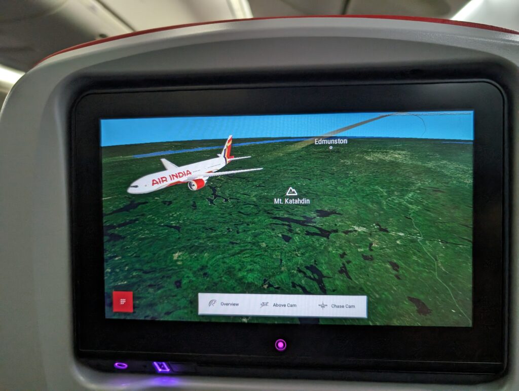 The 3D map on the IFE screen shows the aircraft in the new Air India Livery.