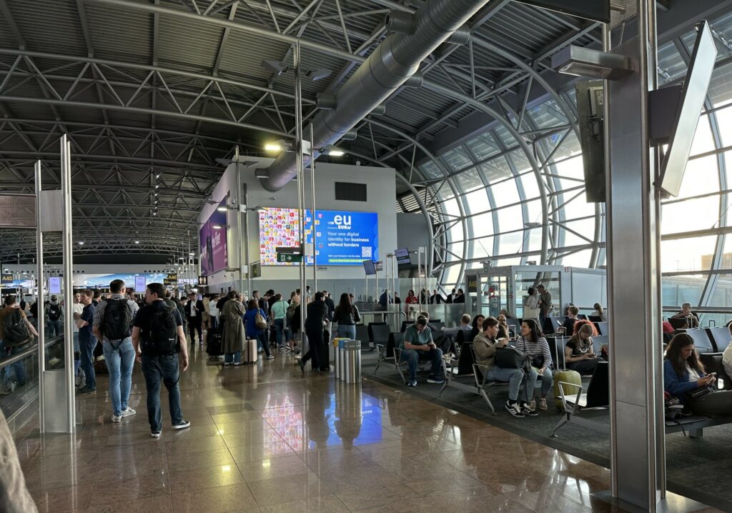 A crowded gate area in the airport.