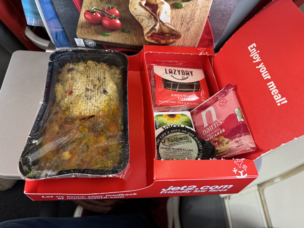 Red branded boxed meal in-flight via Jet2