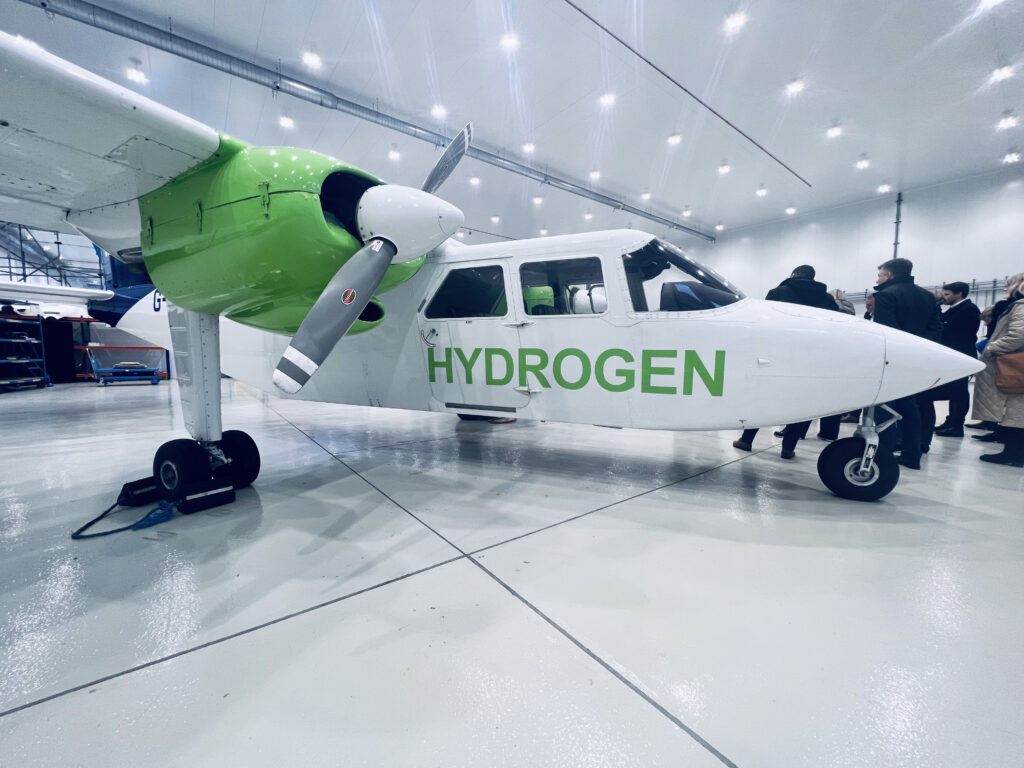 Islander with the word "hydrogen" on the side in green. Cranfield Aerospace Solutions is working to power the Islander with hydrogen.