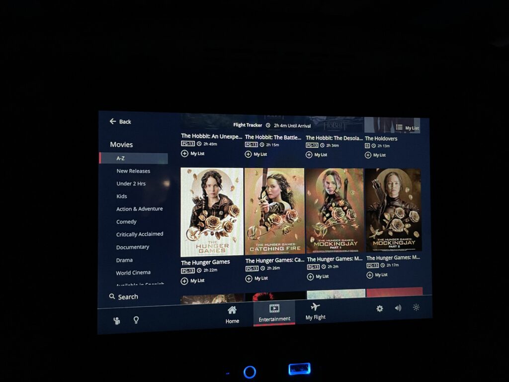 The Hunger Games franchise of movies is displayed on the IFE screen for viewing. 