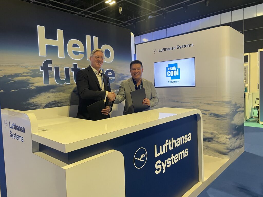 Signing photo left to right Tom Vandendael, CEO Lufthansa Systems Asia Pacific, and Patee Sarasin, CEO of Really Cool Airlines, at the Aviation Festival Asia in Singapore.