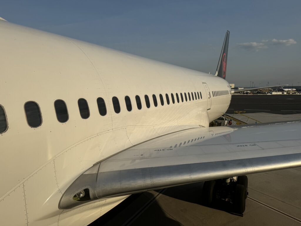 Air Canada's Boeing 787 parked at the gate.