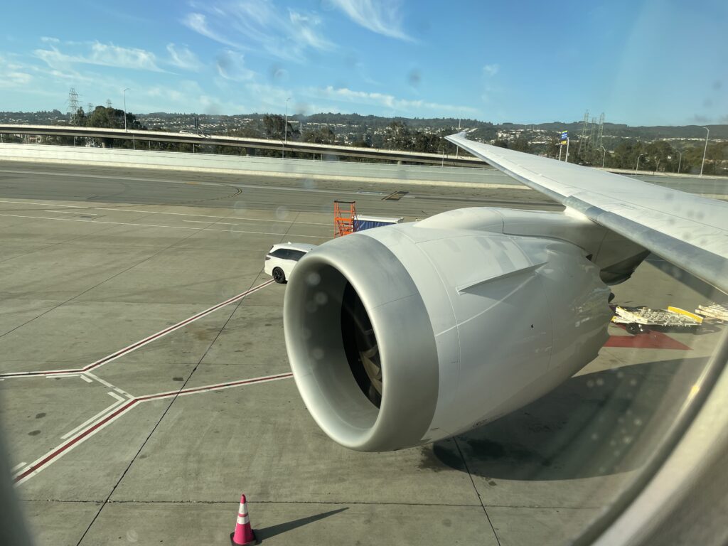 Close up of 787 engine out the window.