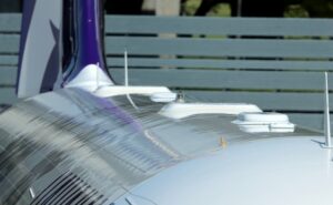 The two Starlink terminals blend in to the collection of antennae atop a Hawaiian A321neo