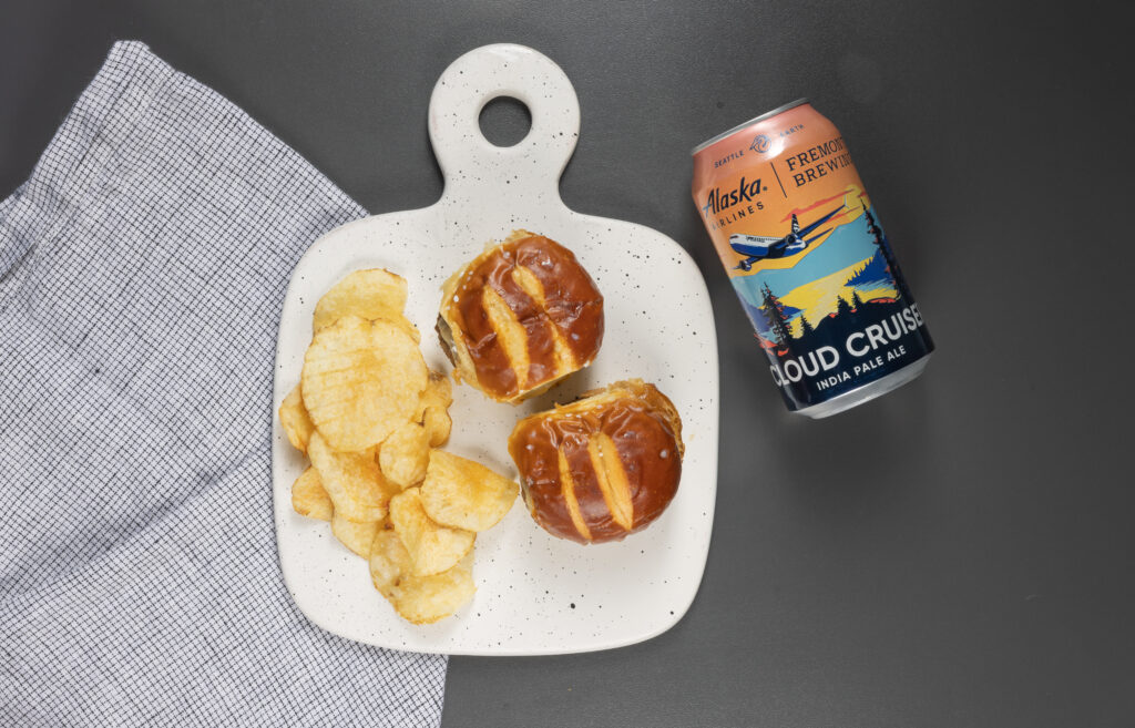 Pretzel Roll Sliders with chips are pictured.