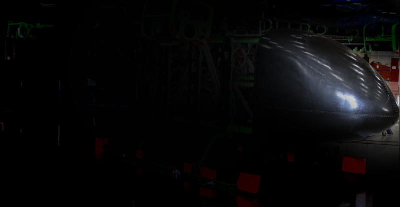 A darkened shot from the video that shows a small part of the Eve eVTOL