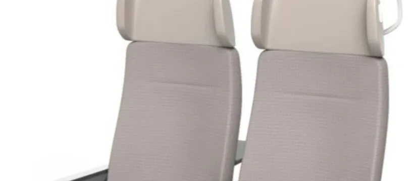 The Recaro Luna seat is medium greyish beige with a light grey headrest and dark grey armrests.