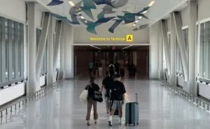 Passengers walking through towards a terminal