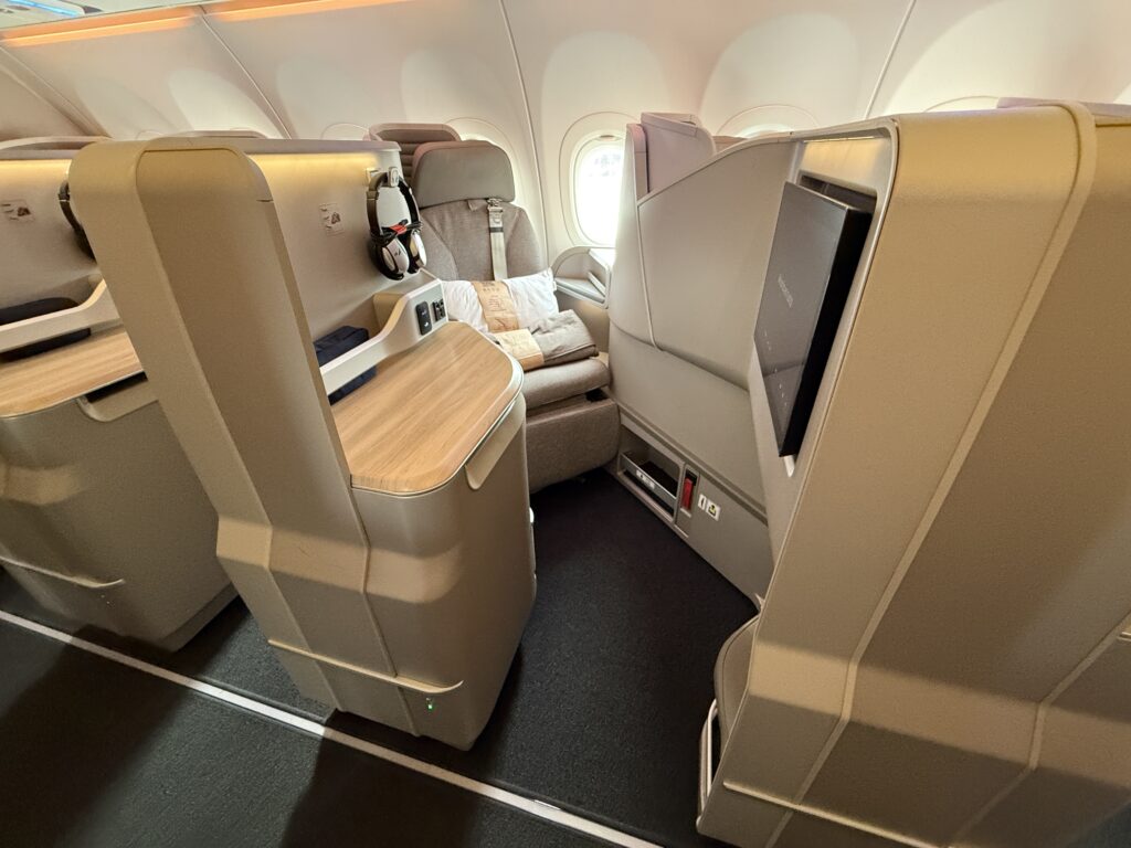 Iberia A321XLR business class seat in various brown tones