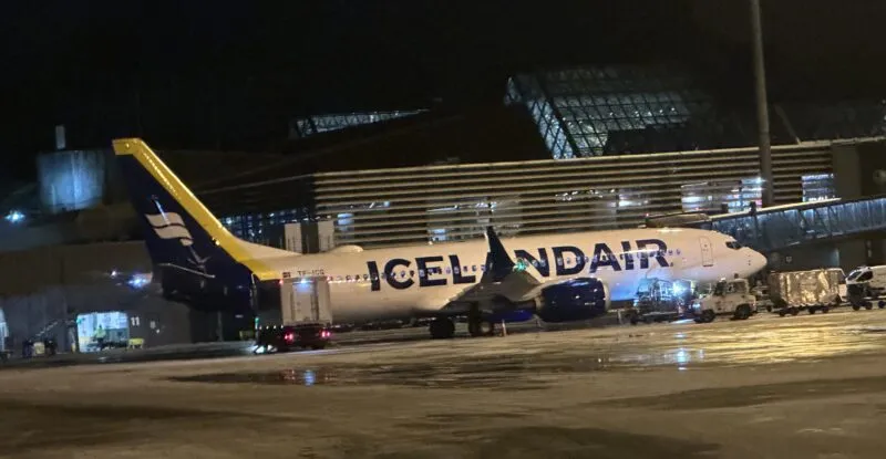 Icelandair 737 MAX at the airport at night.