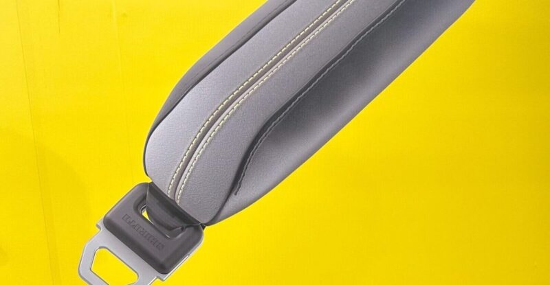 Close up of AirPRO airbag system by SCHROTH on yellow background