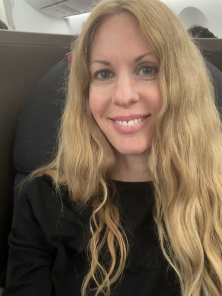 Selfie of the author, Mary Kirby on the Austrian 787