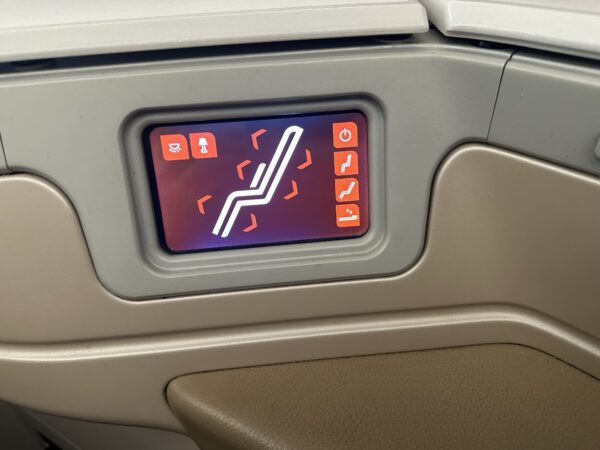 Seat controller with red screen.