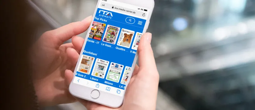 ITA Airways' app with Media Carrier's digital titles displayed on a mobile device.