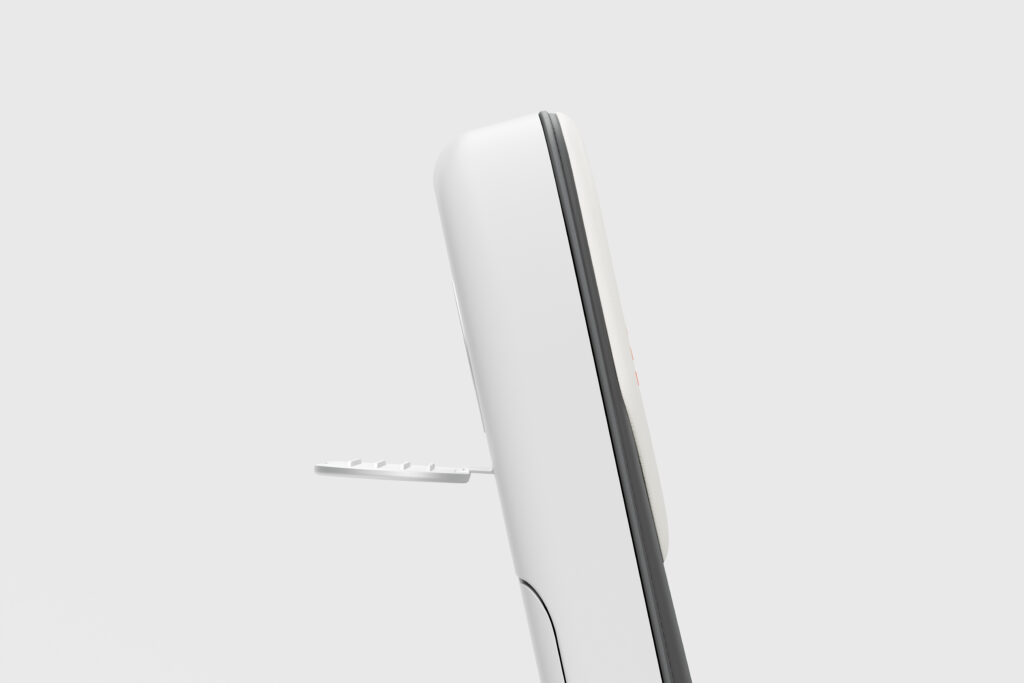A close up of a white very slim seat