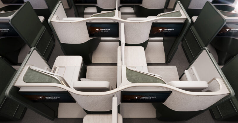 Thompson VantageXL rendering of the all white seat with dark grey shells in an aircraft cabin