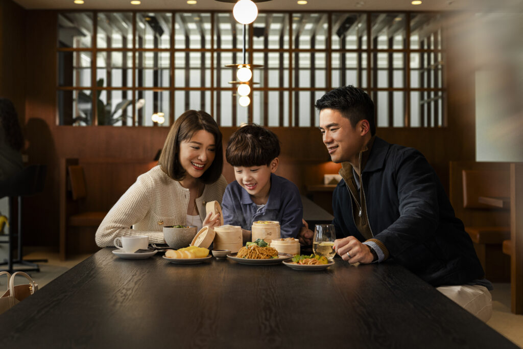 A family is enjoying a meal in The Bridge