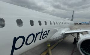 Porter Embraer E195-E2 parked and ready to board.