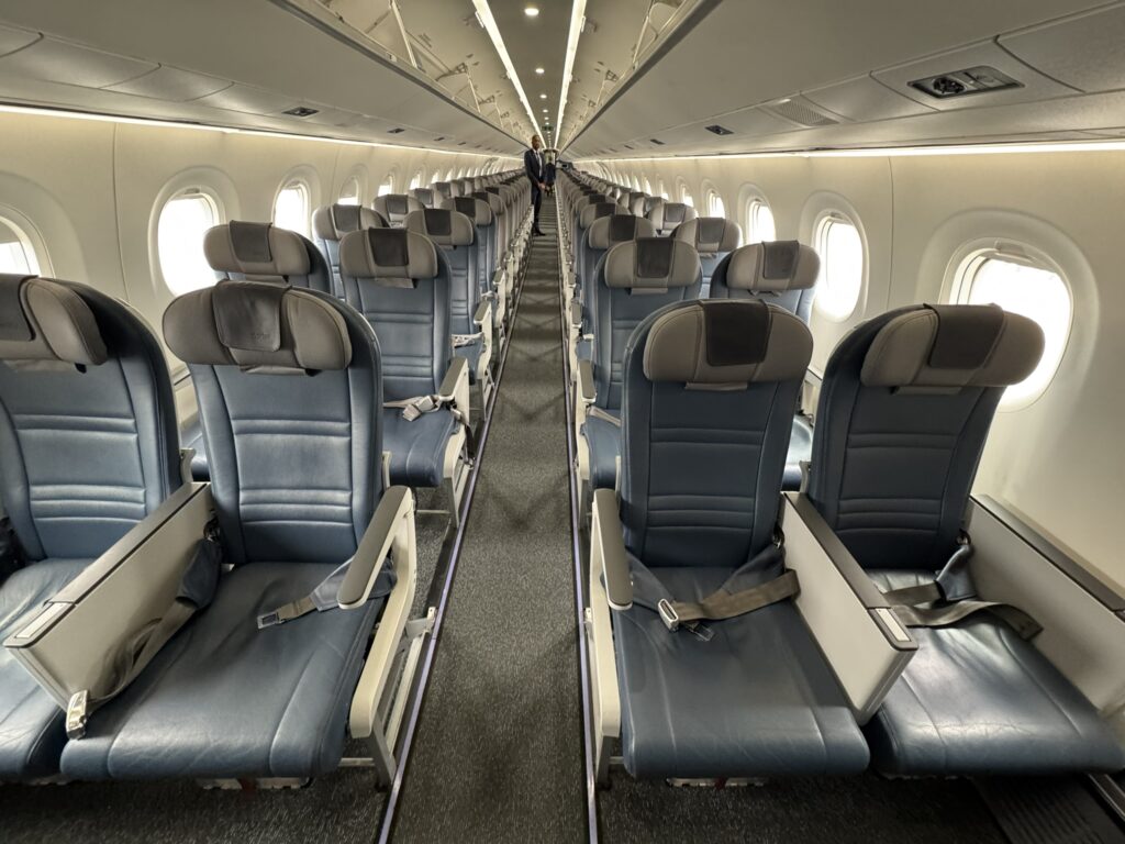 Looking down the Porter Airlines 195-E2 cabin in its 2-2- configuration.