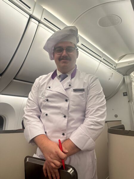 The flying chef poses for a photo.