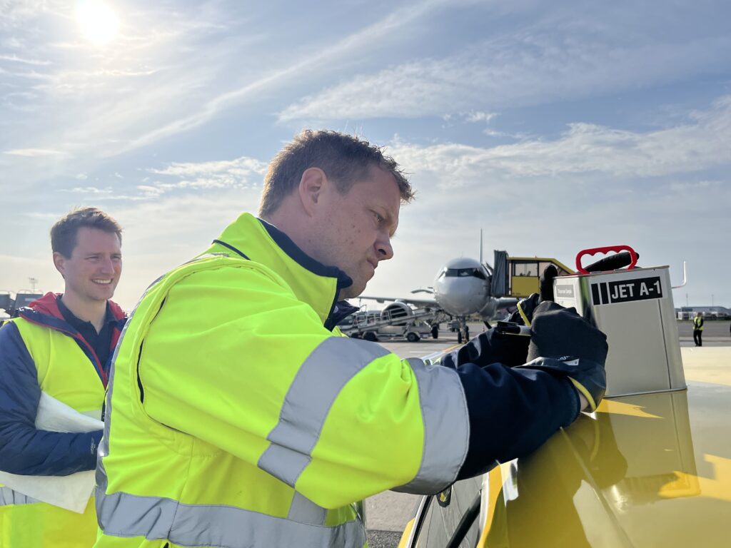A man is prepping to fuel an aircraft. Under the ALIGHT project, various Jet A fuel is being studied.