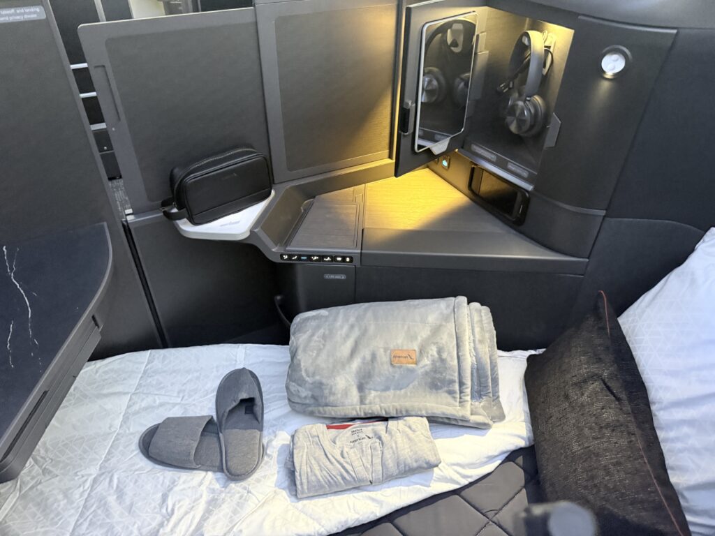 Soft product sits atop the Flagship Suite Preferred seat in bed mode.