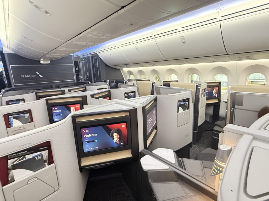 Flagship cabin features lighter CMF for the regular suites and darker CMF for the Flagship Suite Preferred seats up front.