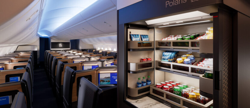 A self-serve bar in United Polaris business class features various drinks and snacks.
