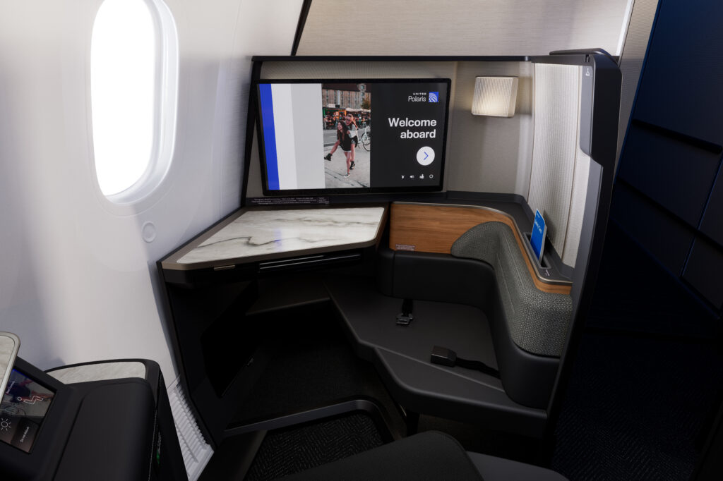 United Polaris Studio suite view of the table, footwell and IFE screen